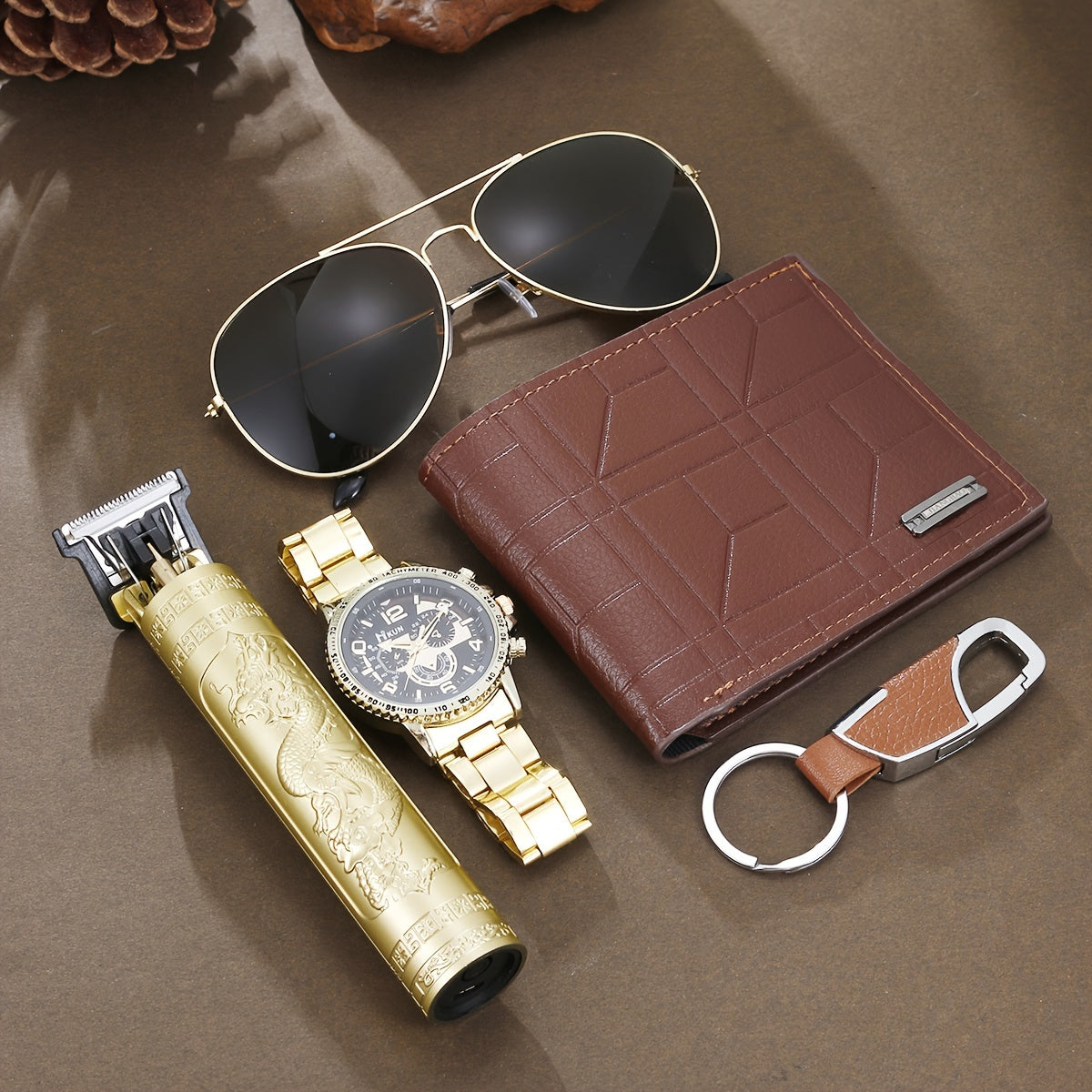 Ensemble cadeau de luxe pour homme, comprenant une montre, un kit de toilettage, un portefeuille, des lunettes de soleil et un porte-clés.