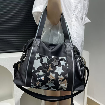 Sac de voyage en nylon de mode féminine avec détail étoilé, grand sac de sport, sac à main et sac à dos croisé de Guangzhou, sac de week-end casual sans peinture de bord